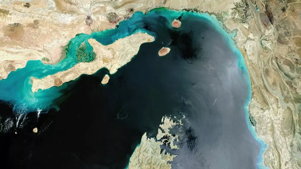 180712 Hormuz GettyImages 843723682 1024x576 The Strait of Hormuz is the most critical maritime choke point in the Middle East, serving as a narrow lifeline for global energy. Its role in the contemporary world economy is undeniable, dictating the regional political economy and the success of international trade. maroonpaper.com STRAIT OF HORMUZ - MAY 2017: Satellite image of the Strait of Hormuz, a strategic maritime choke point with Iran situated at the top with Qeshm Island and the United Arab Emirates to the South. Importance of the Strait of Hormuz in contemporary world economy Middle East, strait, Strait of Hormuz, economic route, Iran, America, Oman, United Arab Emirates, Saudi Arabia, oil trade, regional politics, international politics, war, power, Strait of Hormuz, Hormuz, Strait, Importance, Geo-Politics. MaroonPaper, blog, MaroonPaper blog,