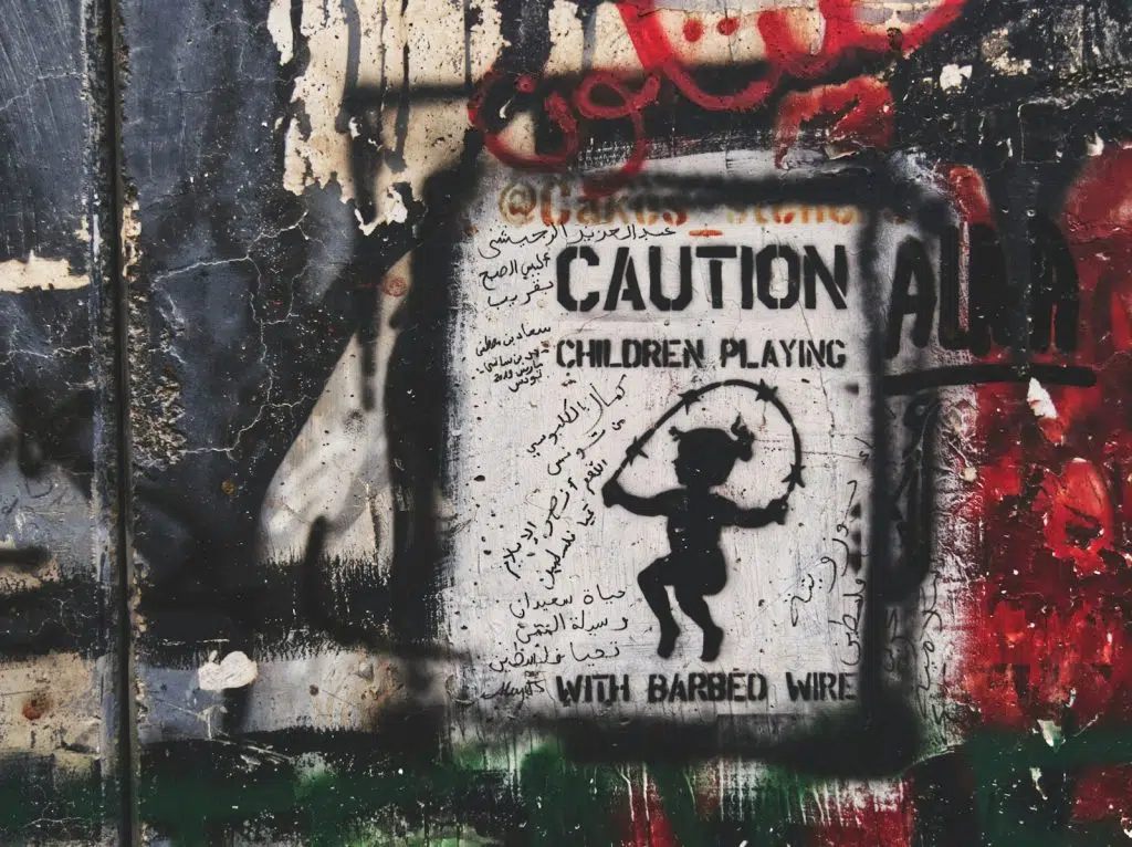 Oqcrcyuijpw 1024x766 Arms being supplied to Israel, caution children playing graffiti